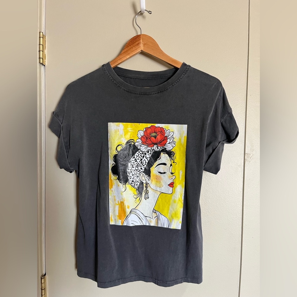 Graphic Black Women’s Art Print Tee with Floral Accent